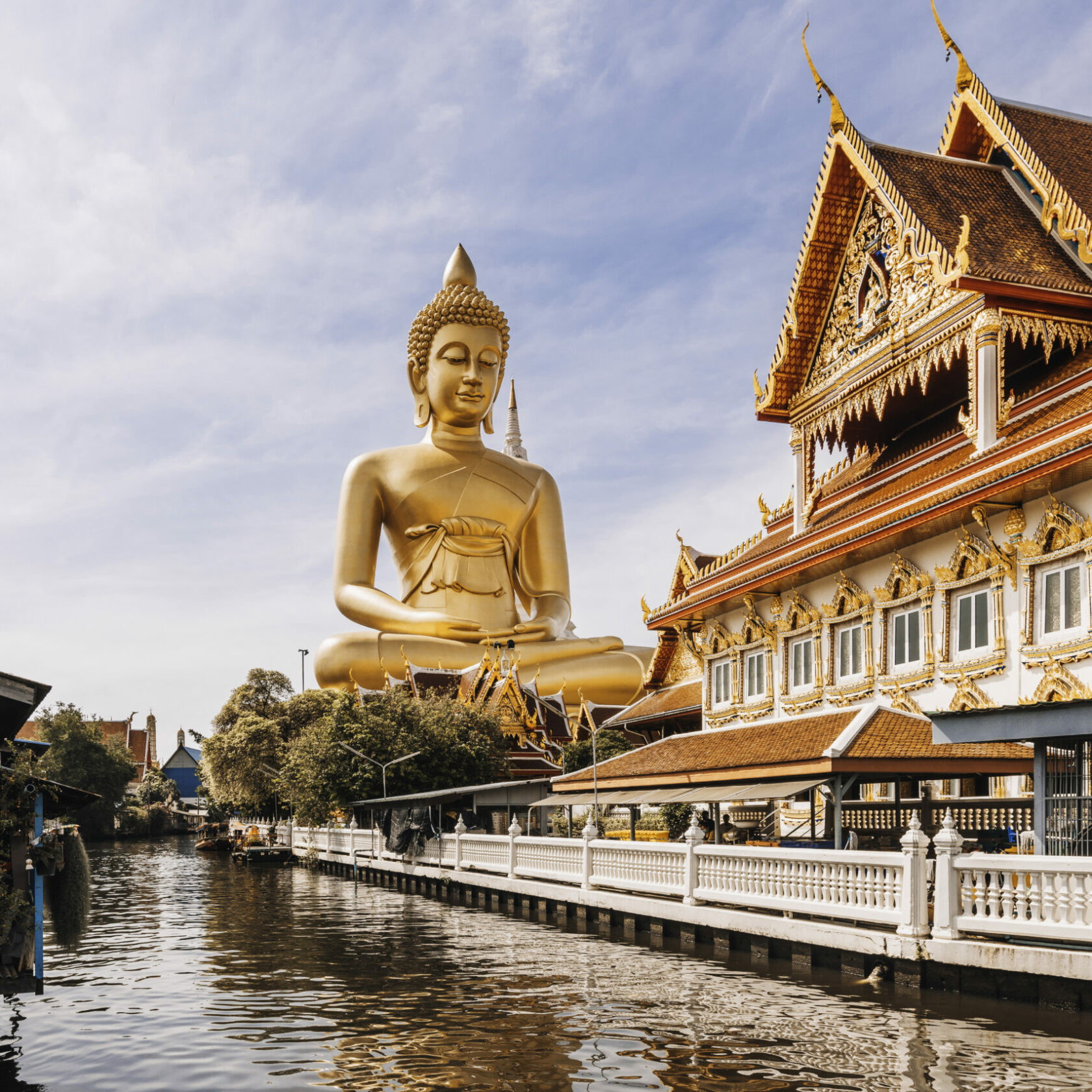 Giant Buddha at Wat Paknam Bhasi Charoen temple in Bangkok, Thailand Phra Buddha Dhammakaya Thep Mongkol is a giant 69-meters Buddha statue located at Wat Paknam Bhasicharoen temple in Bangkok completed in 2021
